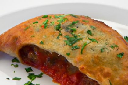 Melted Magic: Cheesy Calzones Paired with Zesty Marinara
