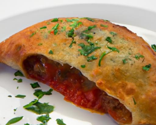 Melted Magic: Cheesy Calzones Paired with Zesty Marinara